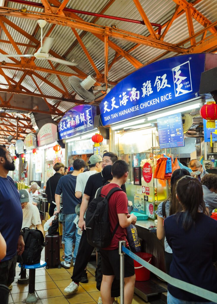 People waiting in line at hawker stall in SIngapore