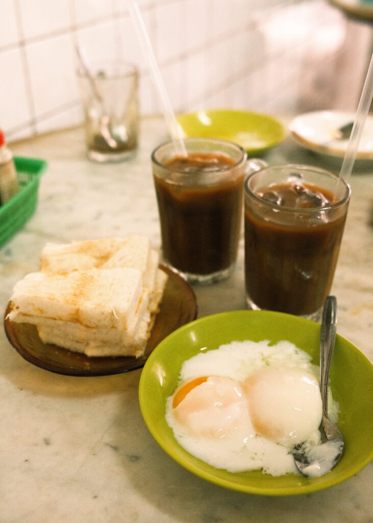 coffee, softboiled eggs, and kaya butter toast